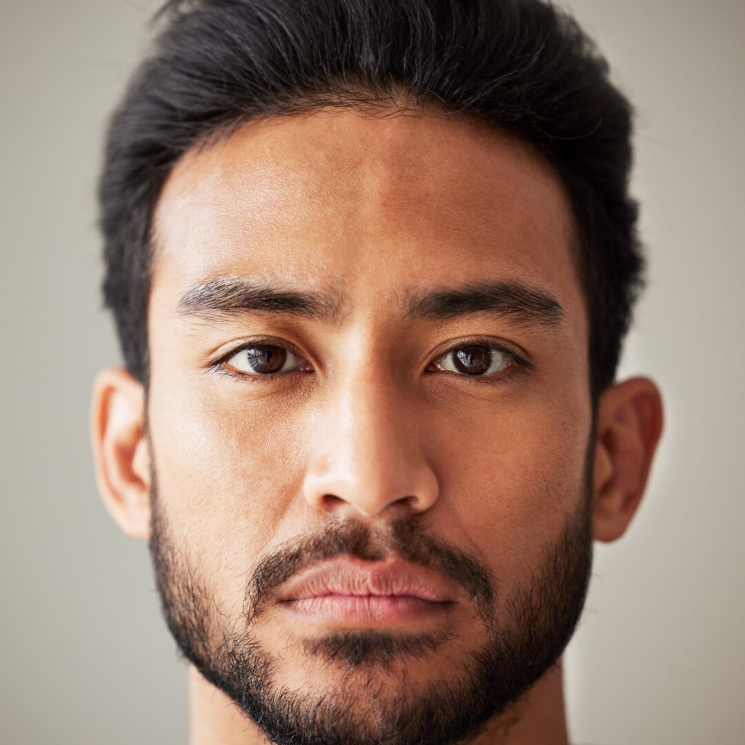 Face, portrait and serious asian man in studio with focus, wellness and awareness. Headshot of a yo