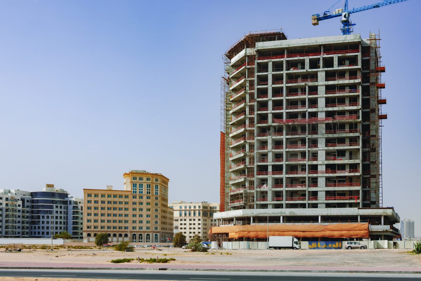 Building construction site in a street in Dubai