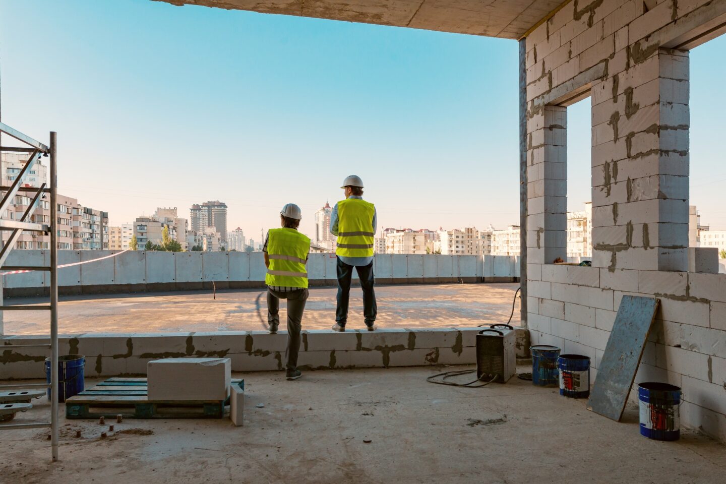 Team of builders of engineers working on a construction site